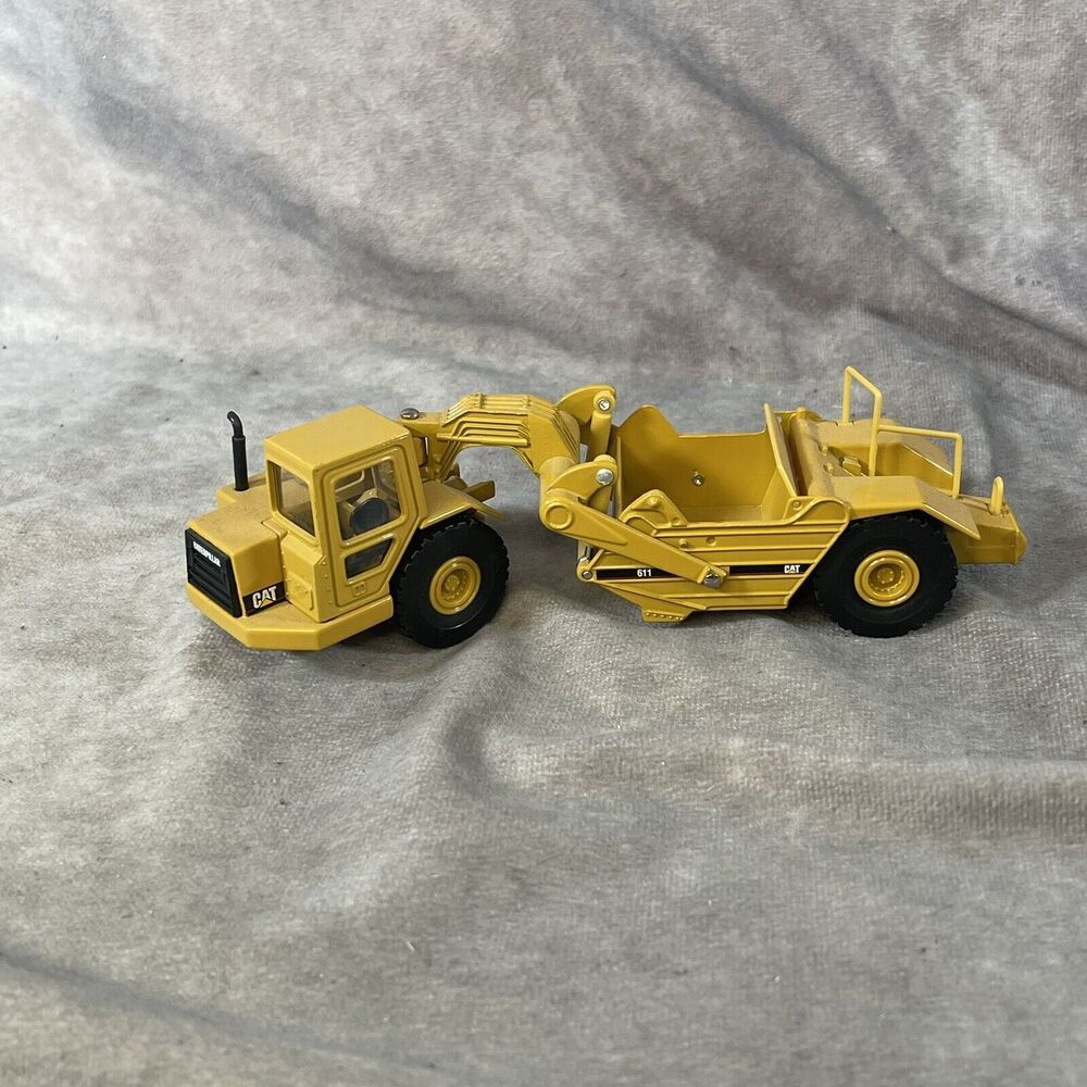 NORSCOT 1/64 Scale Cat Wheel Tractor 611 Scraper Diecast Car Model Toy 55308